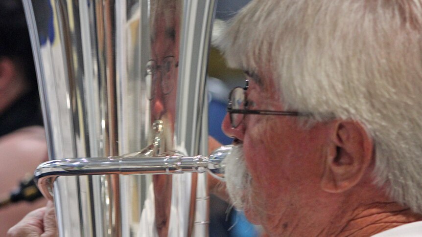 A man plays tuba for the Gold Coast City Wind Orchestra