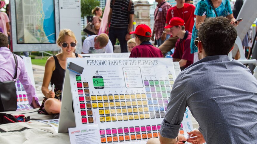 Visitors play the periodic table of elements battleship game at South Bank.