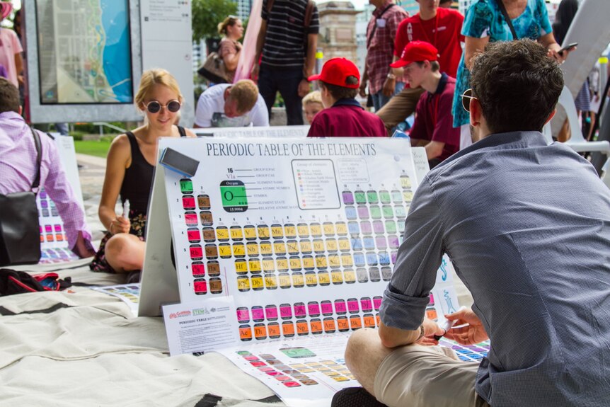 Visitors play the periodic table of elements battleship game at South Bank.