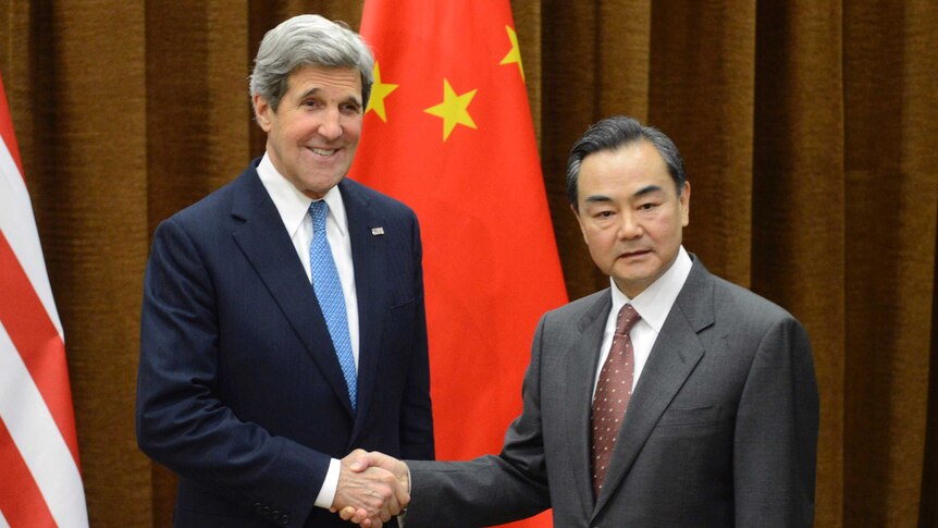 John Kerry and Wang Li