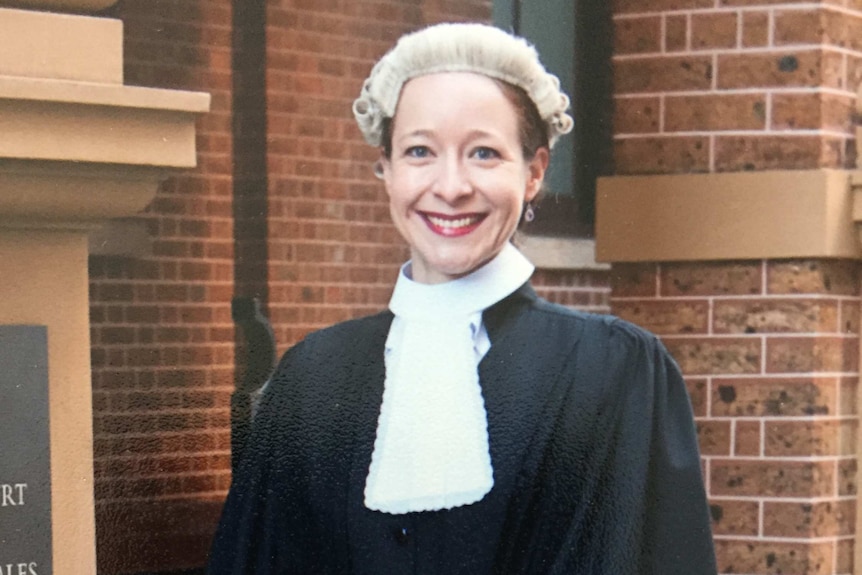 Sharna Clemmett in her legal wigs and robes standing out the NSW Supreme Court