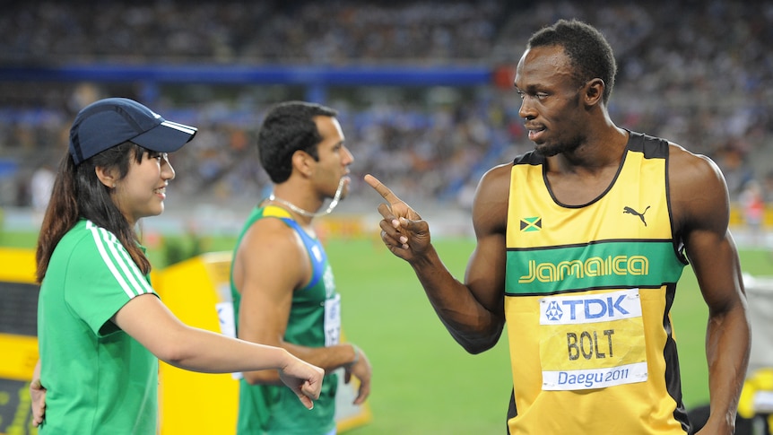 Usain Bolt held off on the flamboyance until after he'd won his way into the final.