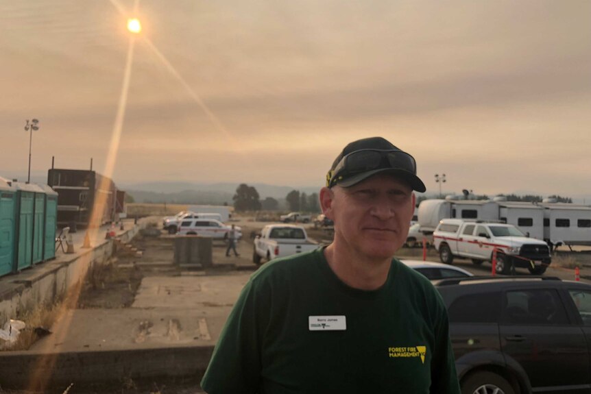 Barry James from Victoria stands in at a firefighting base in California where he's helping locals fight fires.