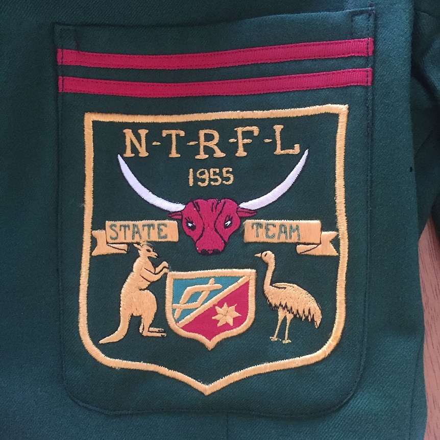 pocket of a blazer for footy team with a buffalo on it