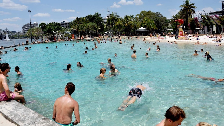 Swimmers beat the heat at Brisbane's South Bank beach.