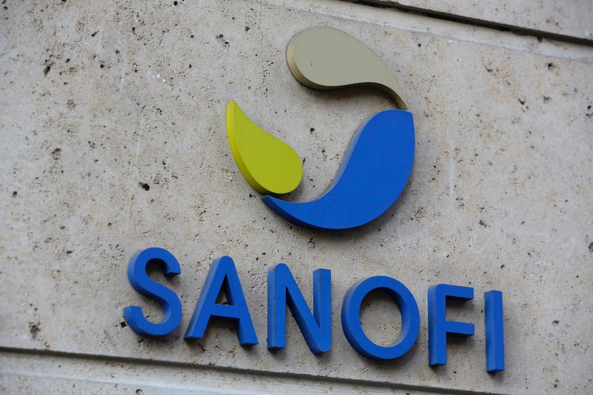 A view of the Sanofi brand logo on a building front.