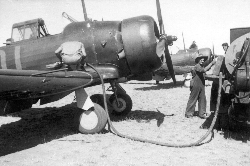 Men working on grounded Wirraways.