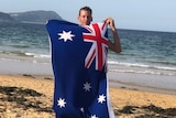 man holding an Australian flag