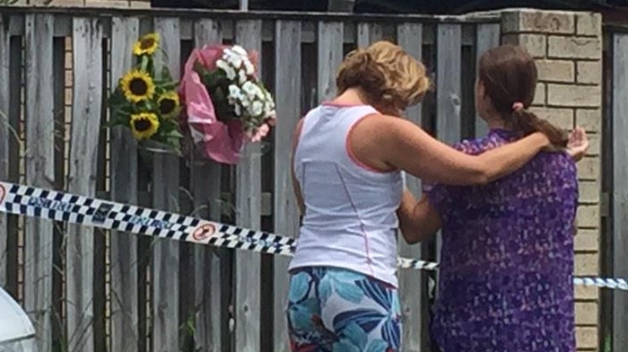 Flowers are being placed outside the home of murdered Varsity Lakes woman Fabiana Palhares