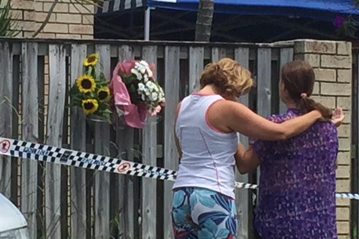 Flowers are being placed outside the home of murdered Varsity Lakes woman Fabiana Palhares