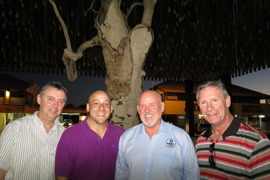 Sean McCarthy, Kevin Hines, John Brady and Kevin Briggs under the Tree of Knowledge in Barcaldine.