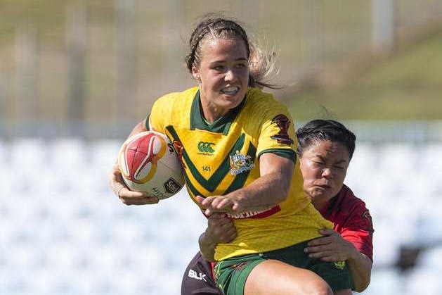 Isabelle Kelly of Australia scores during the Women's Rugby League World Cup