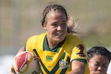 Isabelle Kelly of Australia scores during the Women's Rugby League World Cup