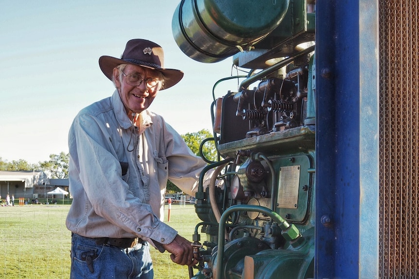 Kununurra resident Murray Shiner with an old diesel engine from a digger.