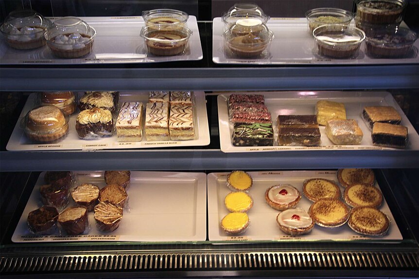 A wide shot of cakes on shelves at Fremantle Hospital's kiosk.