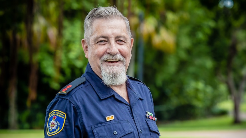 a man in a fire fighter's uniform.