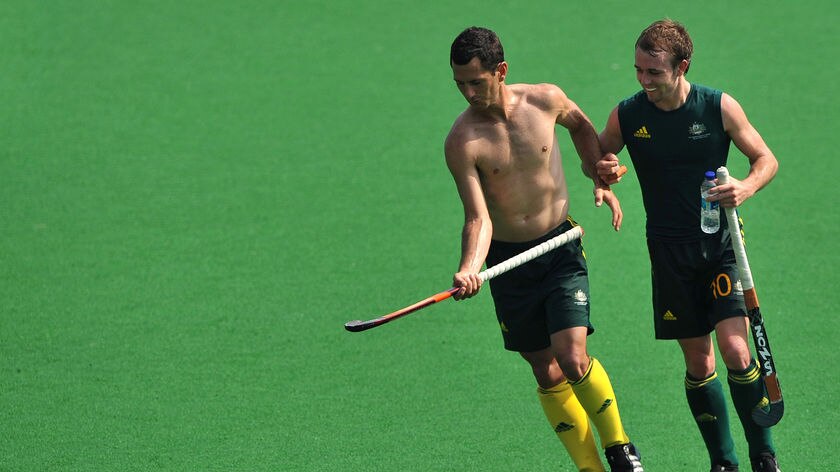Not quite right ... Jamie Dwyer (l) has been training with team-mates' sticks in the absence of his own.