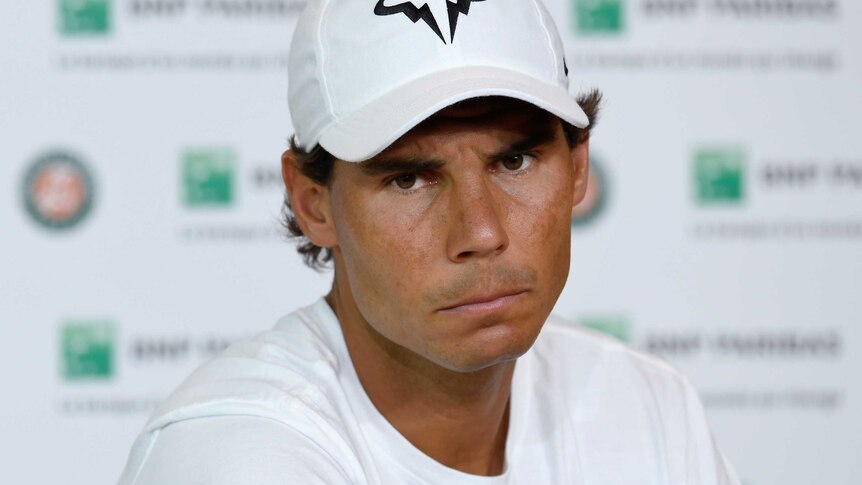 Rafael Nadal looks glum at French Open press conference