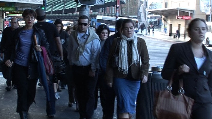 Workers walking on Sydney street generic