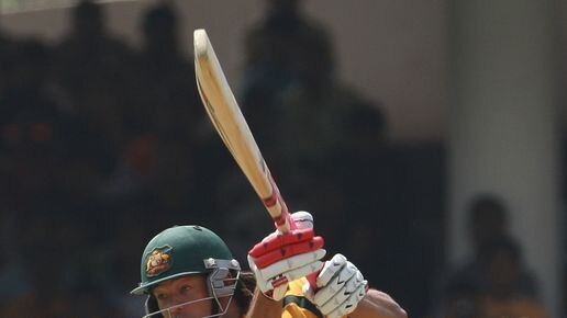 Australian batsman Andrew Symonds through extra cover during the sixth one-day international match