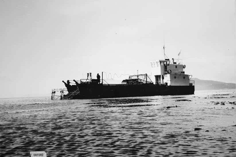 A barge harvesting kelp on the east coast of Tasmania.