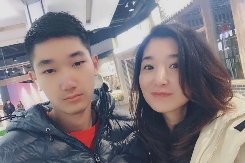 Chinese mother Emma Song and her son pose for picture.