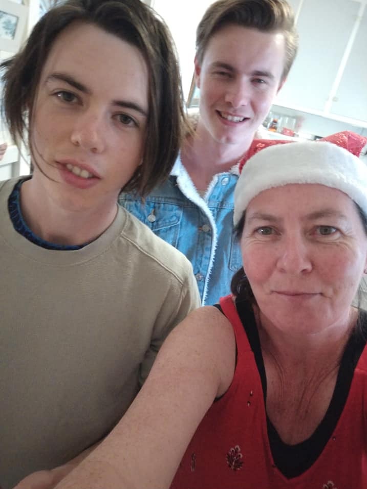 Jodie with her sons Caleb (left) and Isaac (centre).
