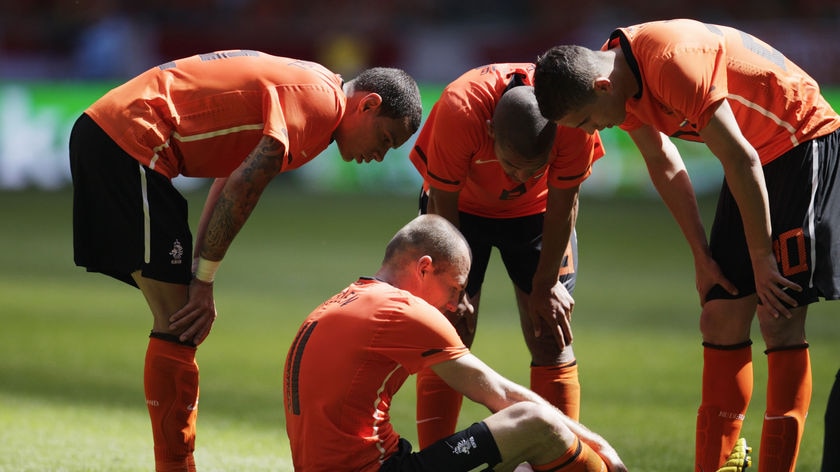 Dutch winger Arjen Robben hits the deck with a thigh injury during the Netherlands' friendly against Hungary.