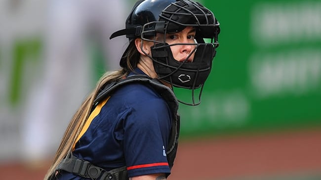 Carly Moore playing baseball