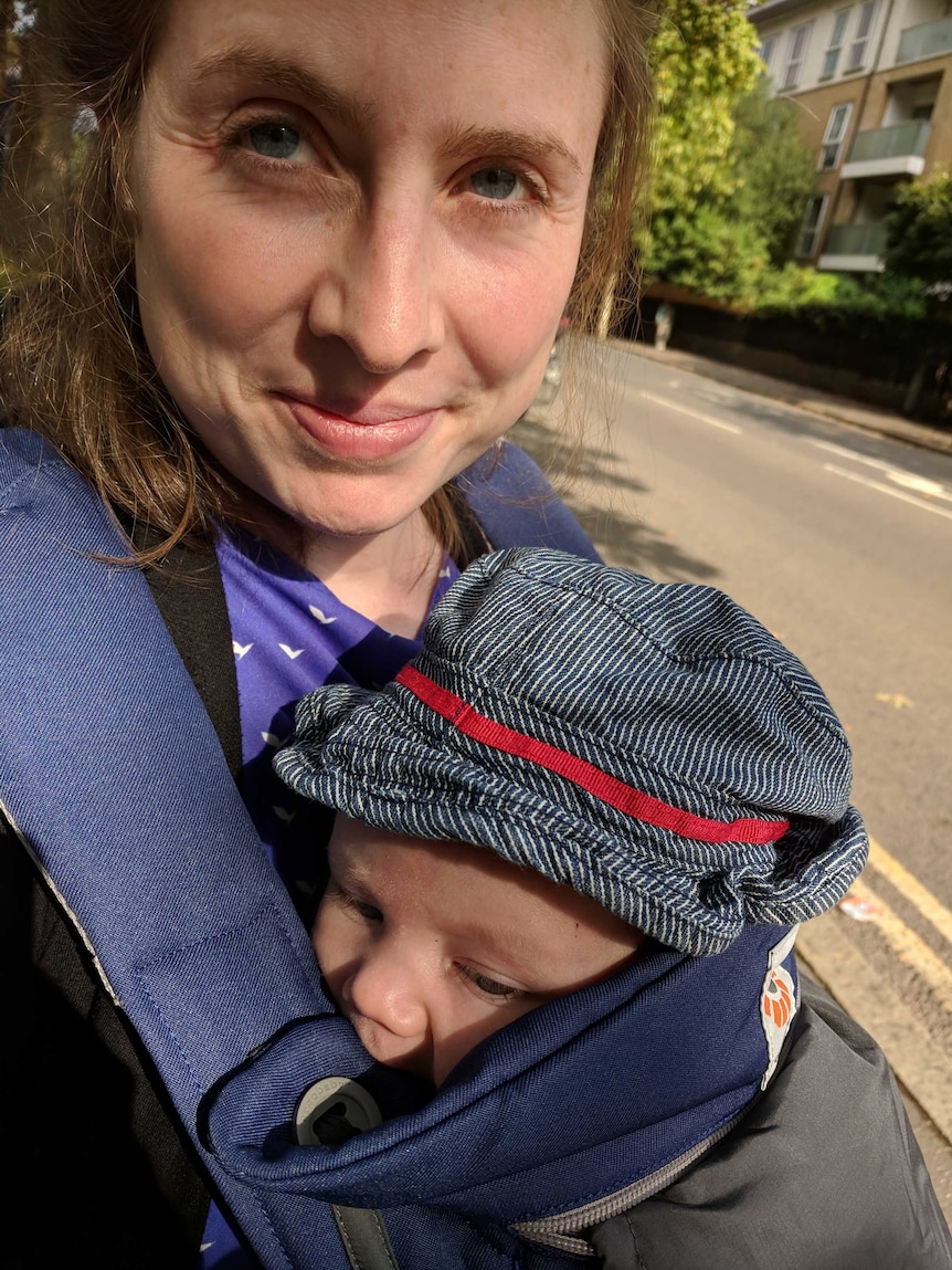 Close-up selfie of Olivia Humphreys and her son, Kit, standing outside.