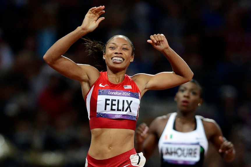 Allyson Felix of the US celebrates winning the women's 200m final at the London 2012 Olympic Games.