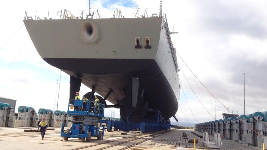 Air Warfare Destroyer Hobart sits on the dock