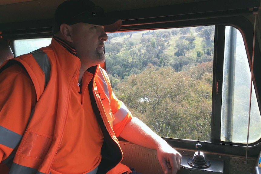 Kev Schultz in the driver's seat of his C-class locomotive.