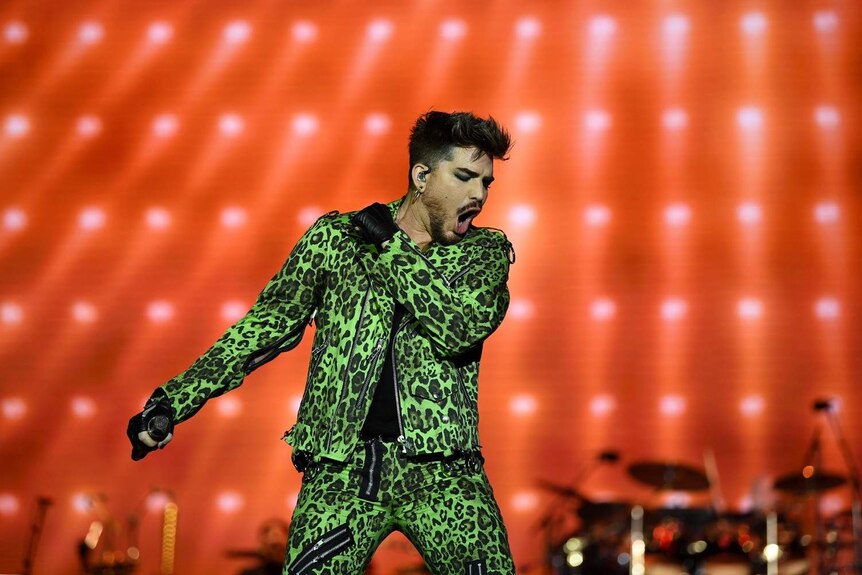 Adam Lambert performing on stage