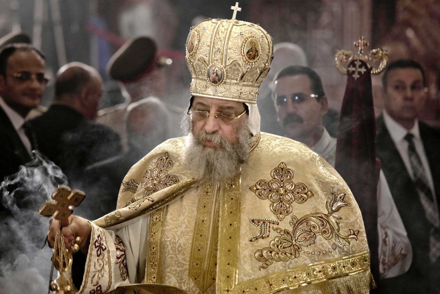 Egyptian Coptic Pope Tawadros II leads prayers during the Easter Eve service