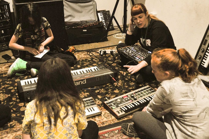 Em Burrows with synthesizers