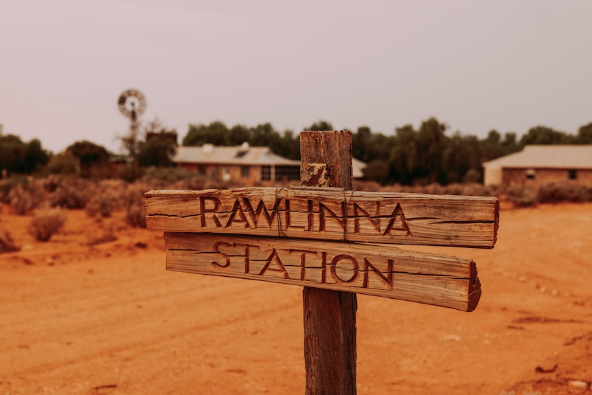 A wooden sign at the entrance to Rawlinna Station.  