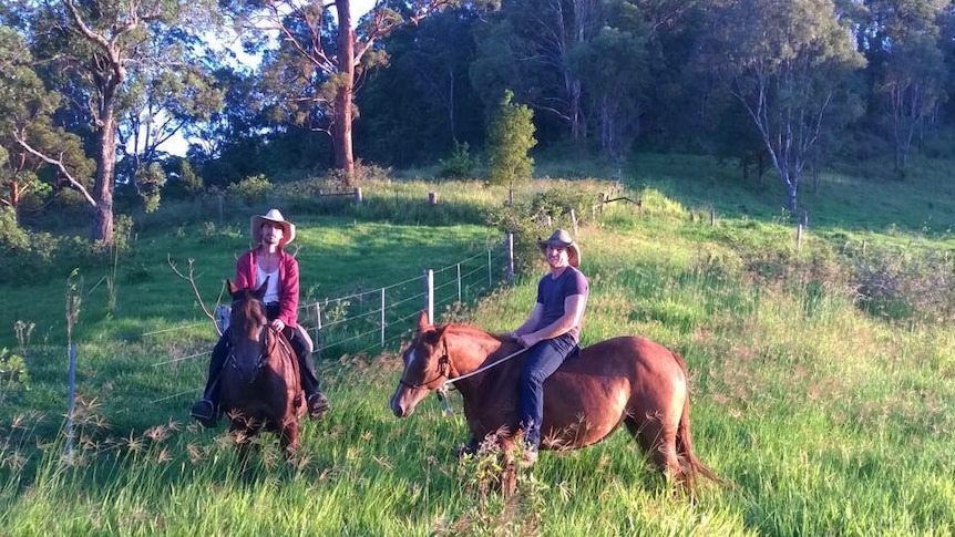 Miki Velickovski (left) and Dan Smith (right) on their farm near Nimbin in northern New South Wales.