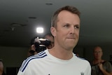 Graeme Swann enters press conference