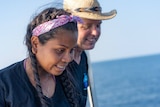 Supranee Thepdet, left, and Chad Elwartowski on their floating home off the coast of Thailand.