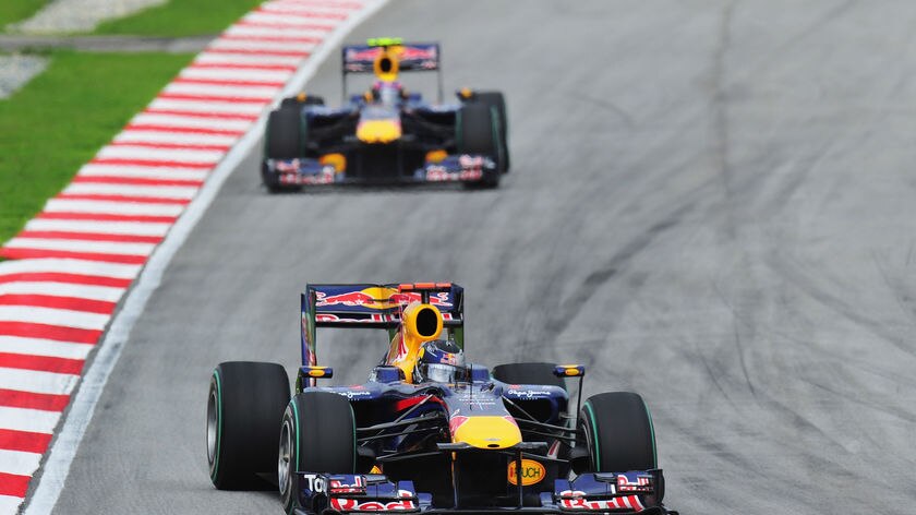 Red Bull one-two: Sebastian Vettel leads Mark Webber in the early stages.