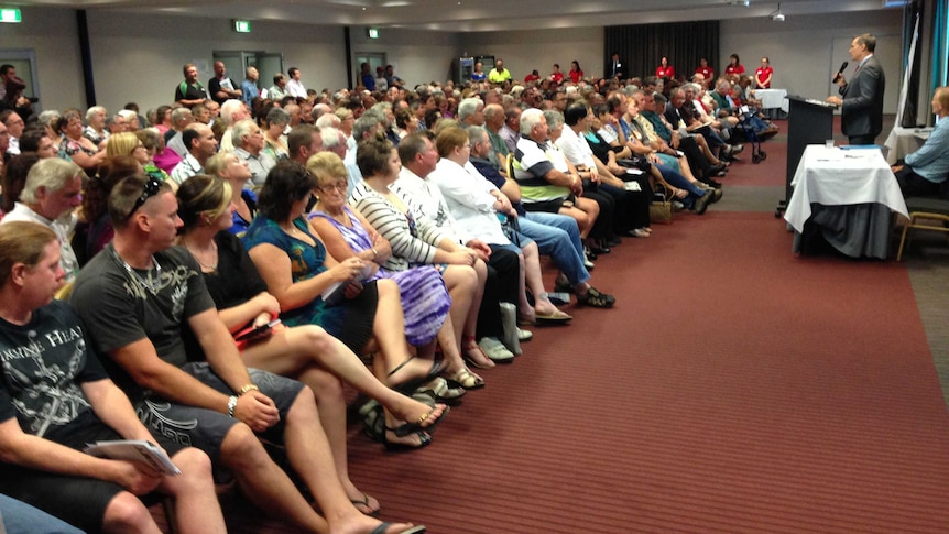 Maurice Blackburn principal Damian Scattini addresses last night's meeting in Ipswich.