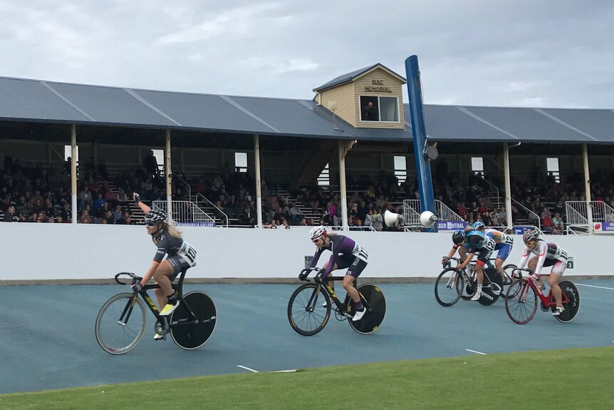 Annette Edmondson is first home in the Women's cycling race at Burnie.