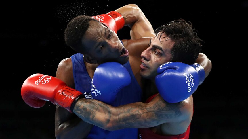 Artem Harutyunyan of Germany fights Lorenzo Sotomayor Collazo of Azerbaijan.