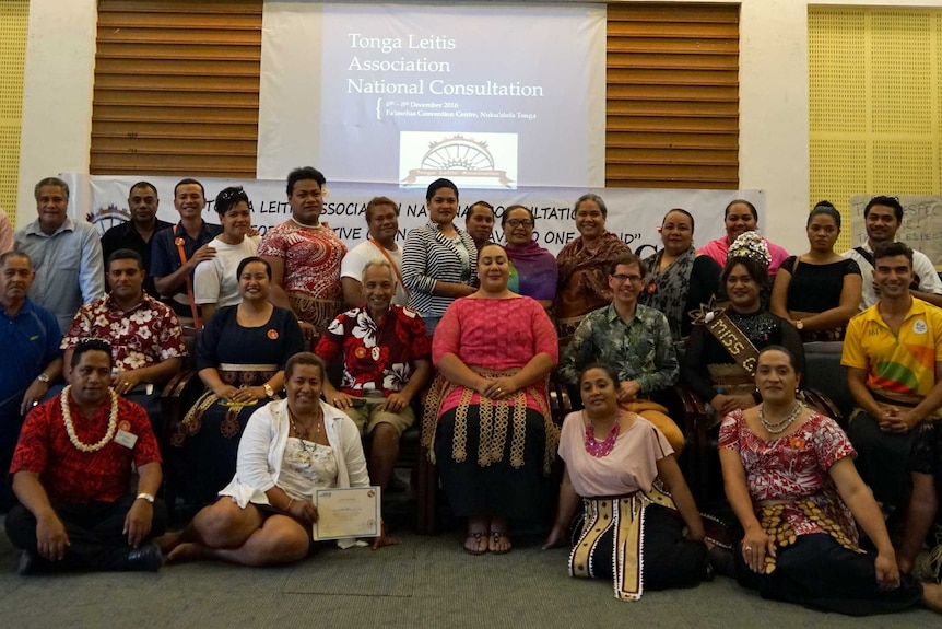 A group of people from the Tonga Leitis Association National Consultation pose for a photo.