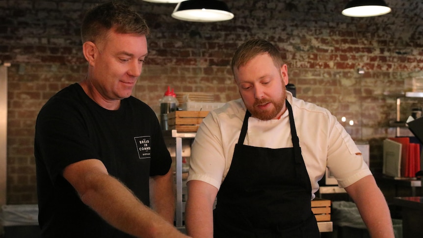 Scott Brannigan alongside his chef.