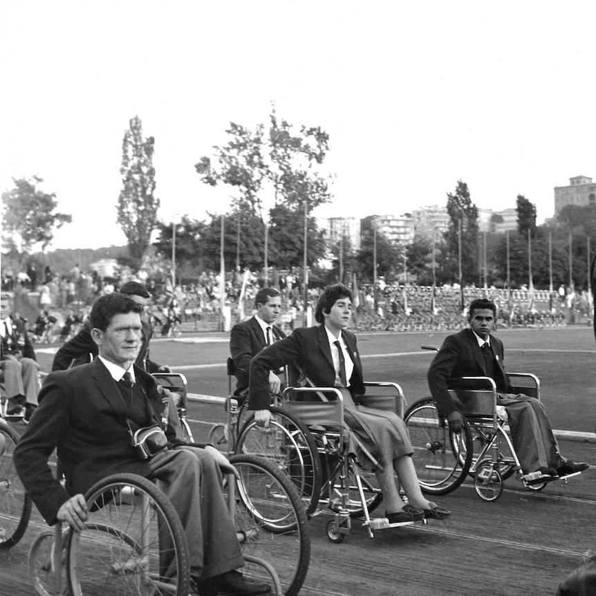 Australian team of wheelchair athletes parading at the Opening Ceremony of the first Paralympic Games in Rome, 1960