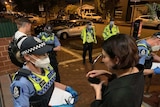 Patrons give police their details outside Hotel Northbridge.