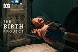 Baby crying after being born with "The Birth Project" written next to it