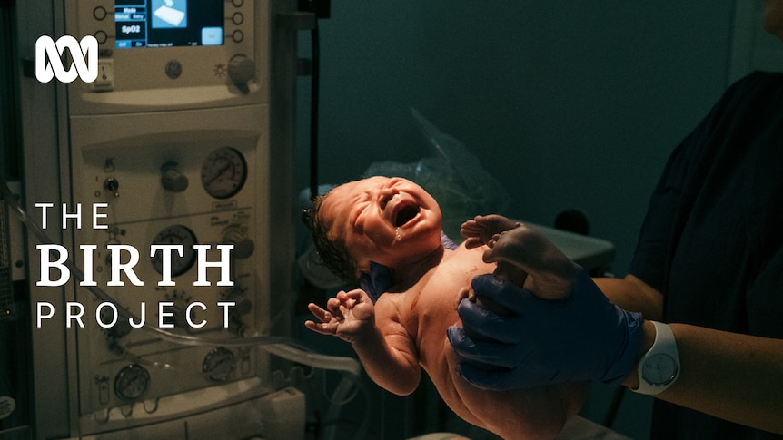 Baby crying after being born with "The Birth Project" written next to it